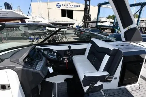 Slide: The Image of 2021 Monterey 278SS Super Sport boat interior with sleek dashboard and comfortable seating. - 25