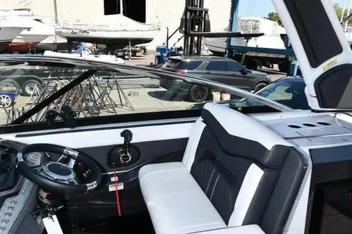 Slide: The Image of 2021 Monterey 278SS Super Sport boat interior with steering wheel and seating. - 23