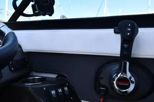 Slide: The Image of Interior view of 2021 Monterey 278SS Super Sport boat controls and steering. - 26