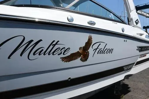 Slide: The Image of 2021 Monterey 278SS Super Sport boat with "Maltese Falcon" name and falcon graphic on the side. - 1