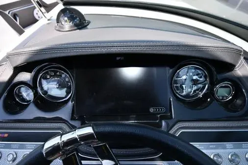 Slide: The Image of Dashboard of a 2021 Monterey 278SS Super Sport boat with modern gauges and controls. - 17