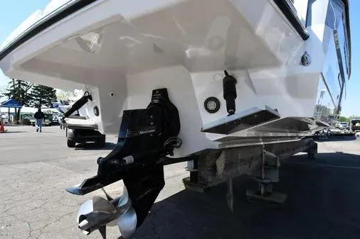 Slide: The Image of 2021 Monterey 278SS Super Sport boat on trailer, rear view showing propeller and hull. - 35
