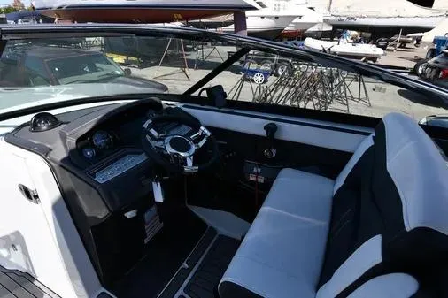 Slide: The Image of 2021 Monterey 278SS Super Sport boat interior with steering wheel and seating. - 30