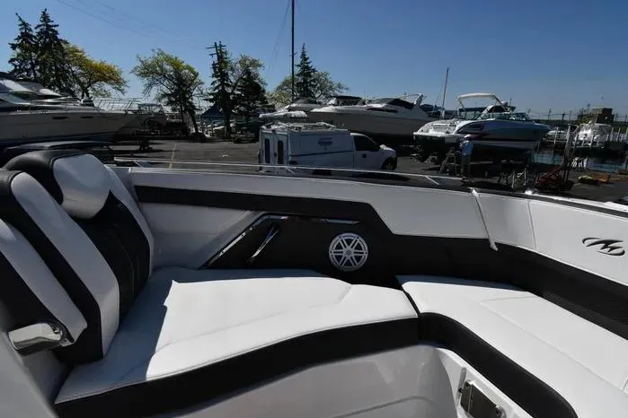 Slide: The Image of Interior of 2021 Monterey 278SS Super Sport boat with white seating and speaker. - 10