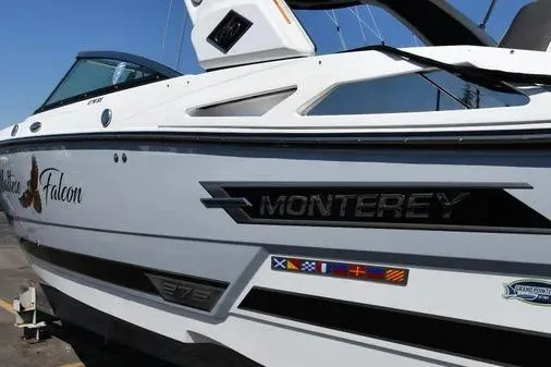 Slide: The Image of 2021 Monterey 278SS Super Sport boat with sleek design and nautical flags. - 2