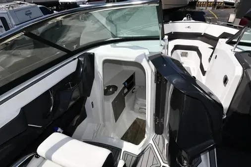 Slide: The Image of 2021 Monterey 278SS Super Sport boat interior with seating and storage area. - 19