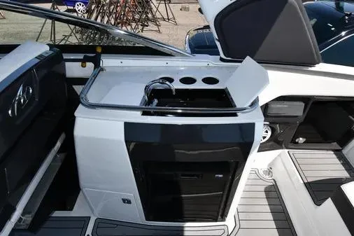 Slide: The Image of 2021 Monterey 278SS Super Sport boat interior with sleek kitchenette and modern design. - 24