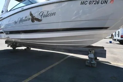 Slide: The Image of 2021 Monterey 278SS Super Sport boat named "The Maltese Falcon" on a trailer. - 34