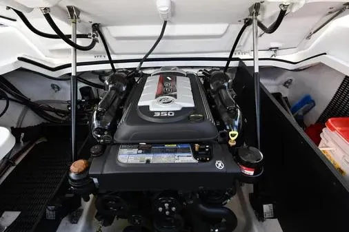 Slide: The Image of Engine compartment of a 2021 Monterey 278SS Super Sport boat, showcasing a powerful 350 engine. - 38