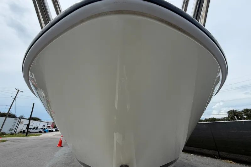 Slide: The Image of Bow view of 2021 Parker Poland 690 Sport boat on trailer. - 8