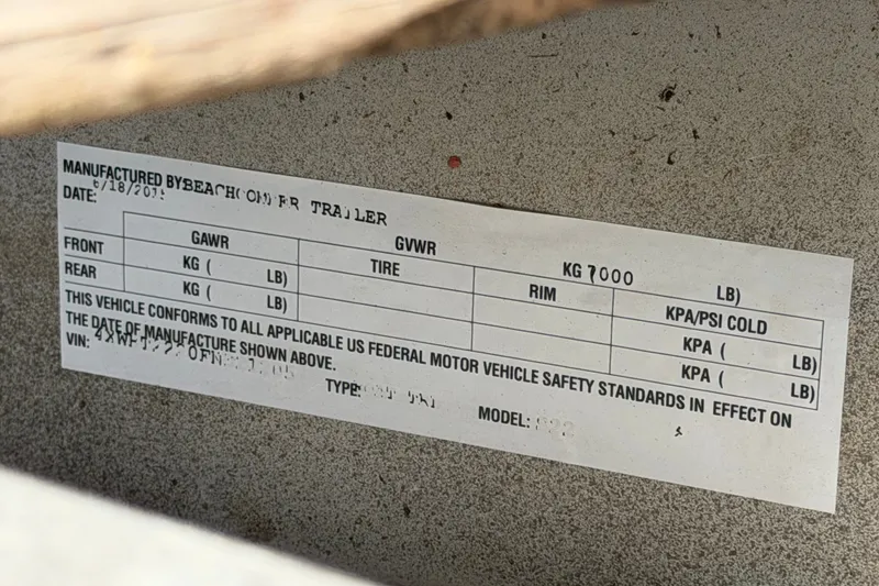 Slide: The Image of Label on trailer showing weight specifications and compliance details, Parker Poland 690 Sport 2021. - 80