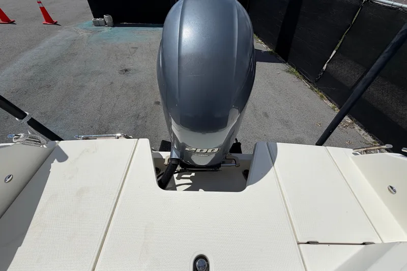 Slide: The Image of 2021 Parker Poland 690 Sport boat with a 200 horsepower outboard motor. - 71