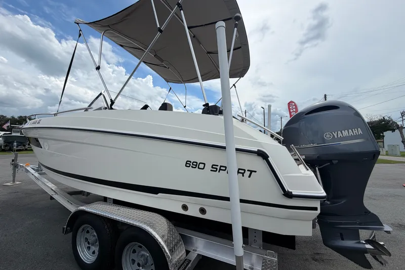 Slide: The Image of 2021 Parker Poland 690 Sport boat with Yamaha engine on trailer. - 5