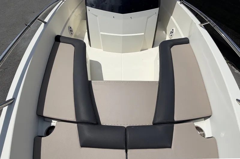 Slide: The Image of 2021 Parker Poland 690 Sport boat interior with cushioned seating and sleek design. - 57