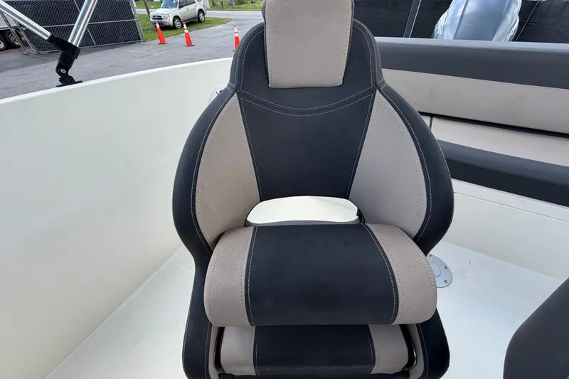 Slide: The Image of Black and gray seat on 2021 Parker Poland 690 Sport boat. - 64