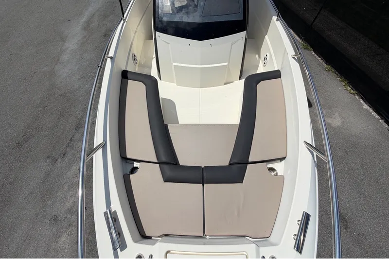 Slide: The Image of 2021 Parker Poland 690 Sport boat with cushioned seating, viewed from above. - 55