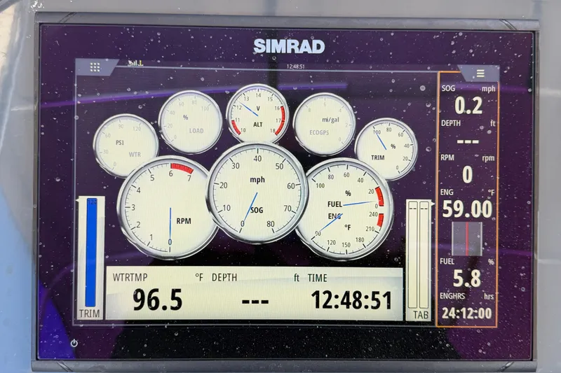 Slide: The Image of Simrad marine display showing gauges and data for Parker Poland 690 Sport, 2021 model. - 21