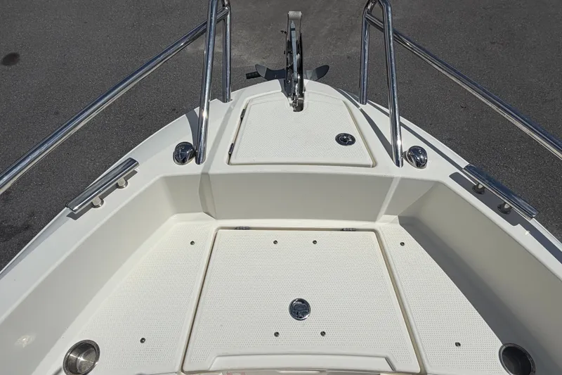Slide: The Image of Bow view of 2021 Parker Poland 690 Sport boat with stainless steel railings. - 48