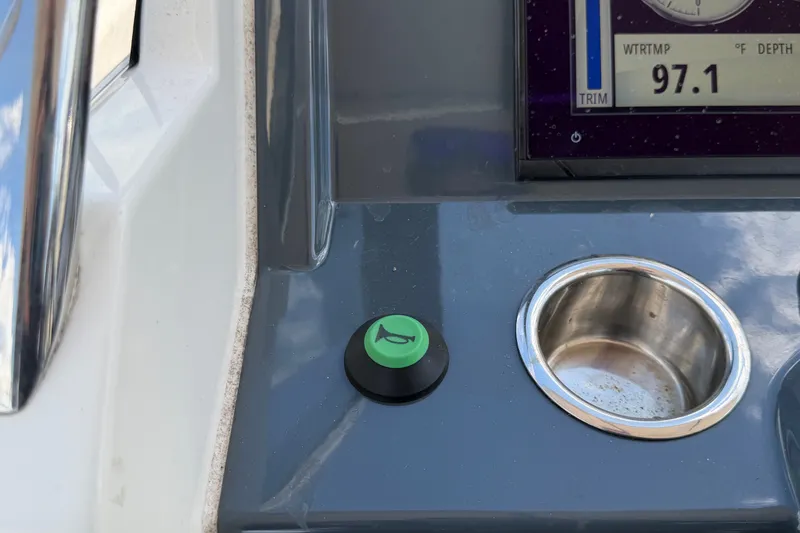 Slide: The Image of Dashboard of 2021 Parker Poland 690 Sport boat with control button and display. - 25
