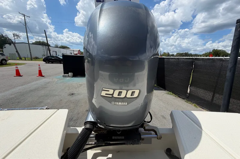 Slide: The Image of Yamaha 200 outboard motor on a 2021 Parker Poland 690 Sport boat. - 77