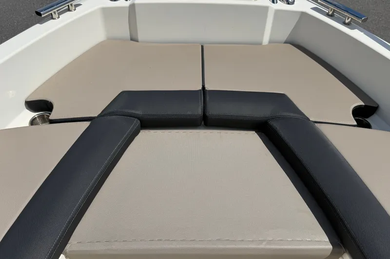 Slide: The Image of 2021 Parker Poland 690 Sport boat interior with cushioned seating area. - 47