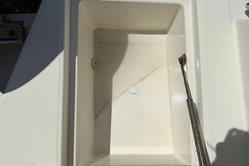 Slide: The Image of Storage compartment of 2021 Parker Poland 690 Sport boat, showing interior details. - 76