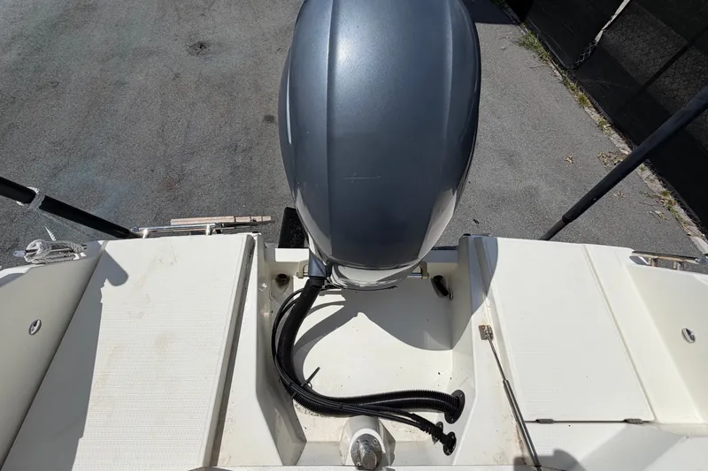 Slide: The Image of 2021 Parker Poland 690 Sport boat with outboard motor, viewed from above. - 74