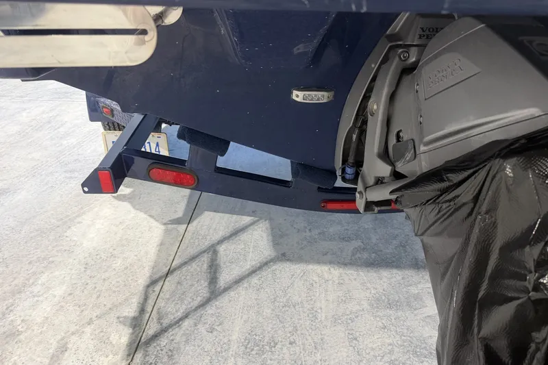 Slide: The Image of Rear view of a 2021 Regal LS2 boat with Volvo Penta outdrive. - 7