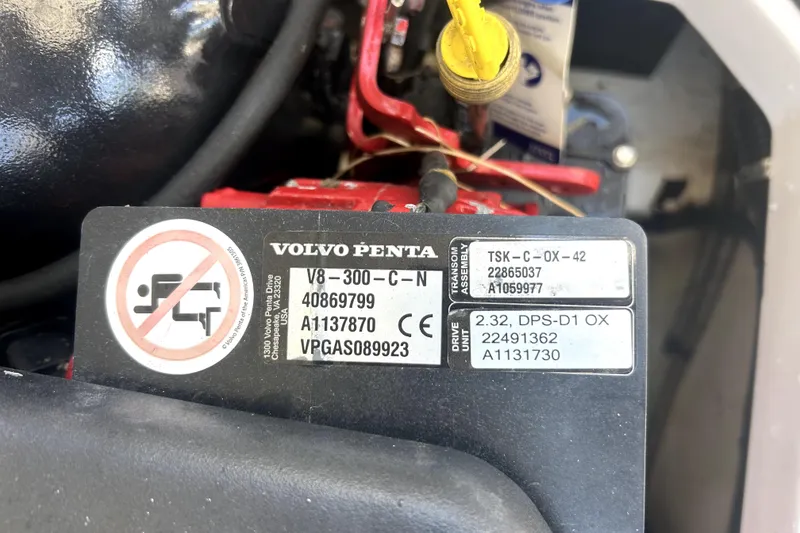 Slide: The Image of Volvo Penta engine label on 2021 Regal 26 FasDeck boat, displaying model and specifications. - 77