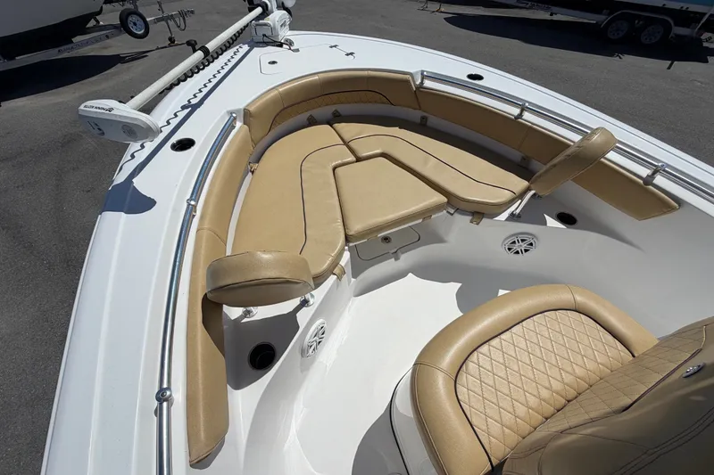 Slide: The Image of 2021 Sportsman Heritage 211 Center Console boat with tan seating and modern design. - 37