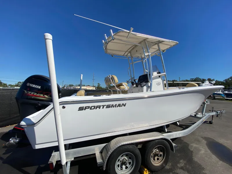 Slide: The Image of 2021 Sportsman Heritage 211 Center Console boat on trailer, side view. - 2