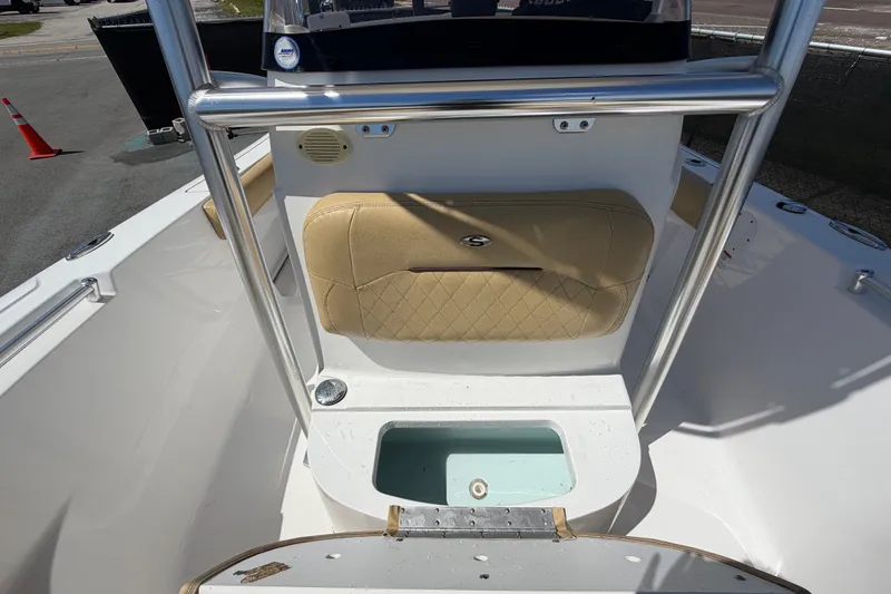Slide: The Image of 2021 Sportsman Heritage 211 Center Console interior with seating and storage compartment. - 58