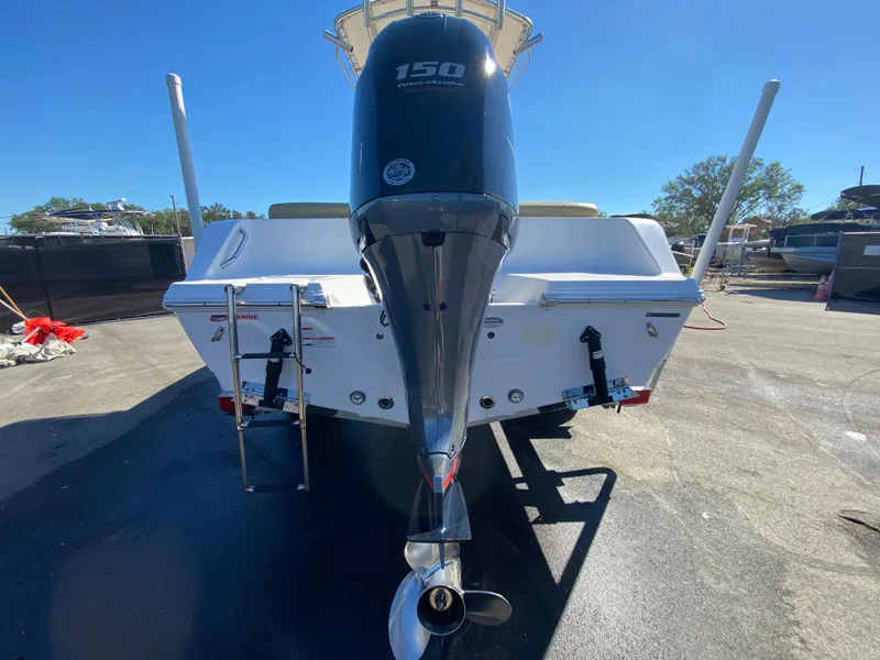 Slide: The Image of 2021 Sportsman Heritage 211 Center Console boat with powerful outboard motor. - 4