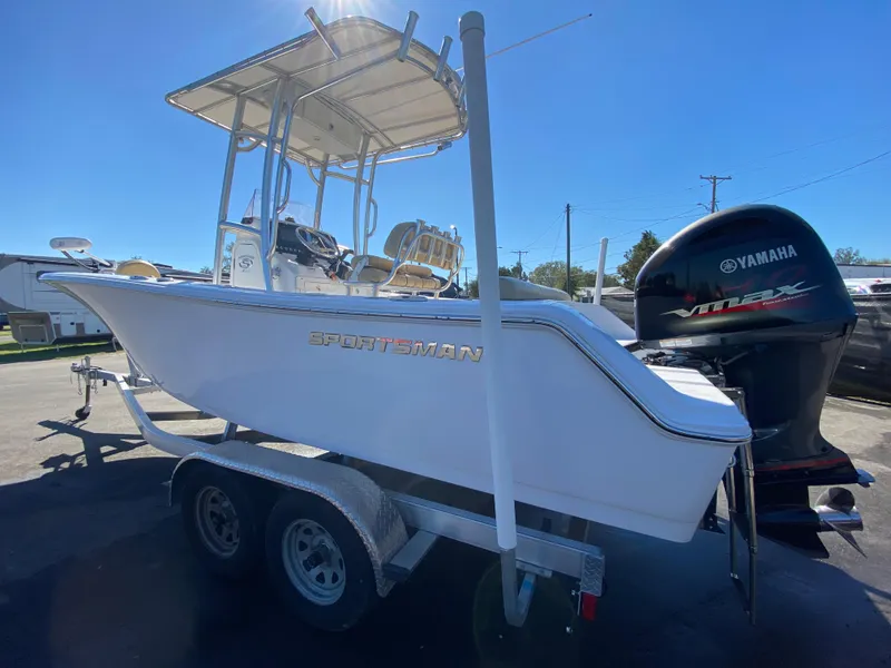 Slide: The Image of 2021 Sportsman Heritage 211 Center Console boat on trailer with Yamaha outboard motor. - 6