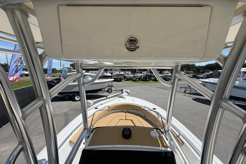 Slide: The Image of 2021 Sportsman Heritage 211 Center Console boat interior view at dealership. - 18