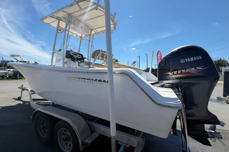 Slide: The Image of 2021 Sportsman Heritage 211 Center Console boat with Yamaha VMAX engine. - 7