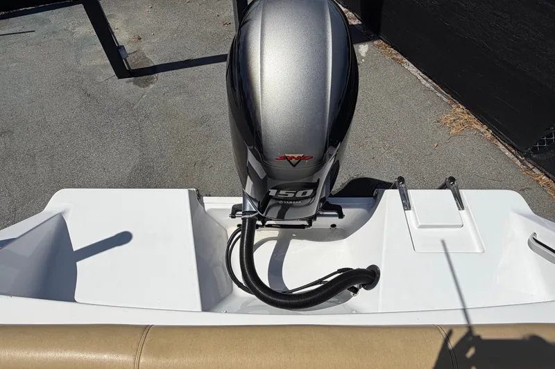 Slide: The Image of 2021 Sportsman Heritage 211 Center Console with Yamaha 150 outboard motor. - 75
