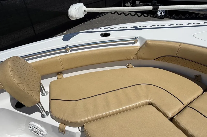 Slide: The Image of 2021 Sportsman Heritage 211 Center Console boat with tan cushioned seating. - 40