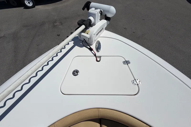 Slide: The Image of Bow of a Sportsman Heritage 211 Center Console boat with anchor hatch and seating. - 49