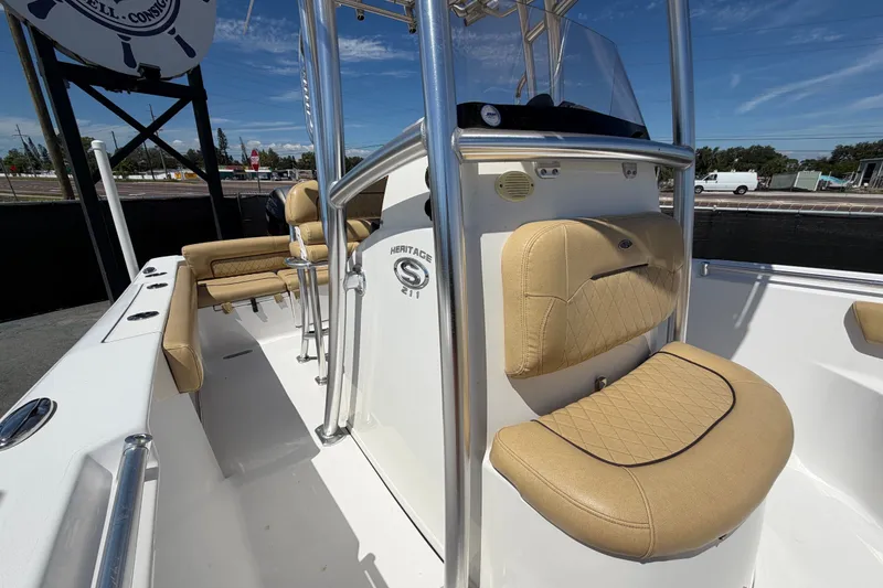 Slide: The Image of 2021 Sportsman Heritage 211 Center Console boat with tan seating and sleek design. - 59