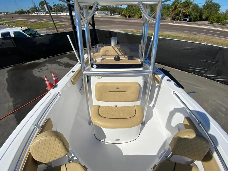 Slide: The Image of 2021 Sportsman Heritage 211 Center Console boat with tan seating and sleek design. - 34