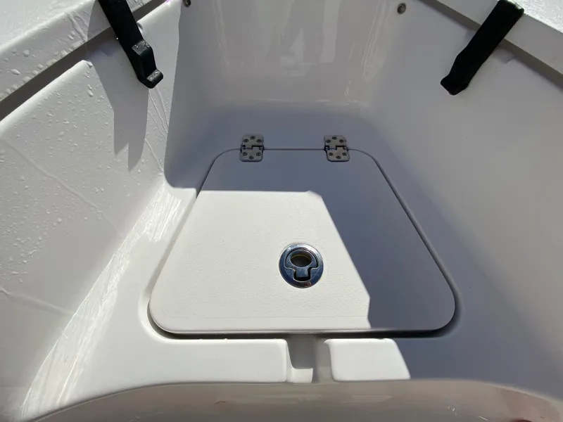 Slide: The Image of 2021 Sportsman Heritage 211 Center Console storage compartment detail. - 25