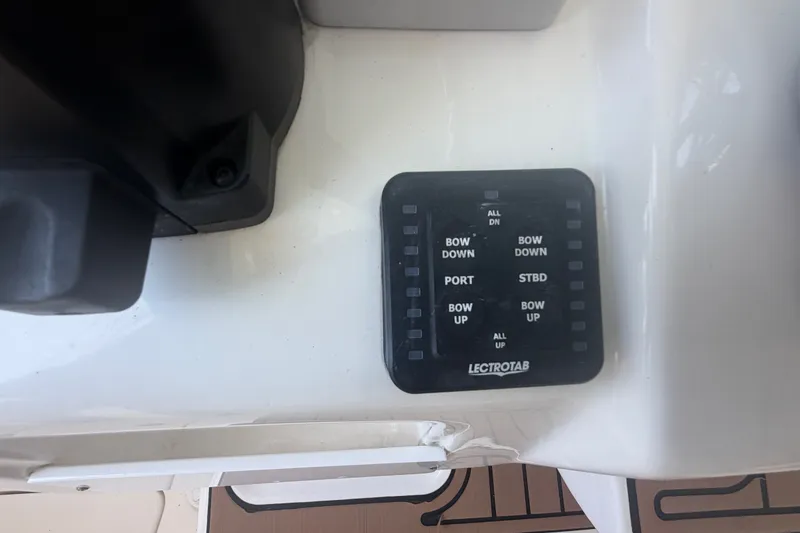 Slide: The Image of Control panel on a 2021 Tidewater 272 CC Adventure boat. - 18