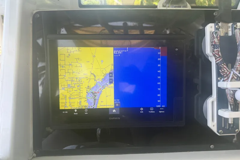 Slide: The Image of Garmin navigation display on 2021 Tidewater 272 CC Adventure boat dashboard. - 15