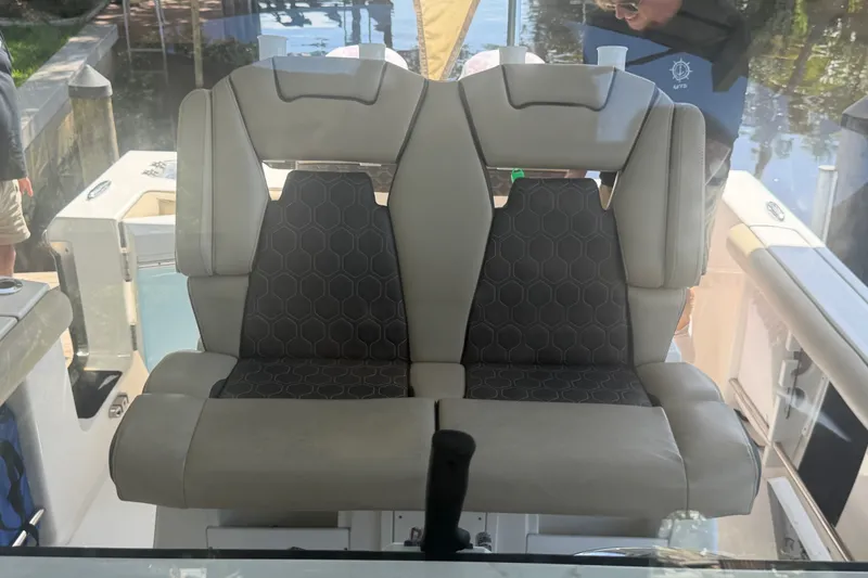 Slide: The Image of 2021 Tidewater 272 CC Adventure boat seats with hexagonal pattern upholstery. - 34