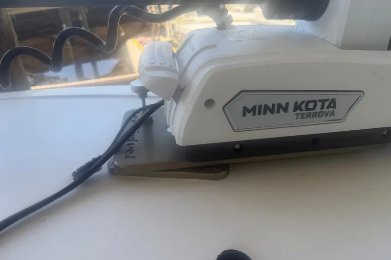 Slide: The Image of Minn Kota Terrova motor on 2021 Tidewater 272 CC Adventure boat deck. - 31