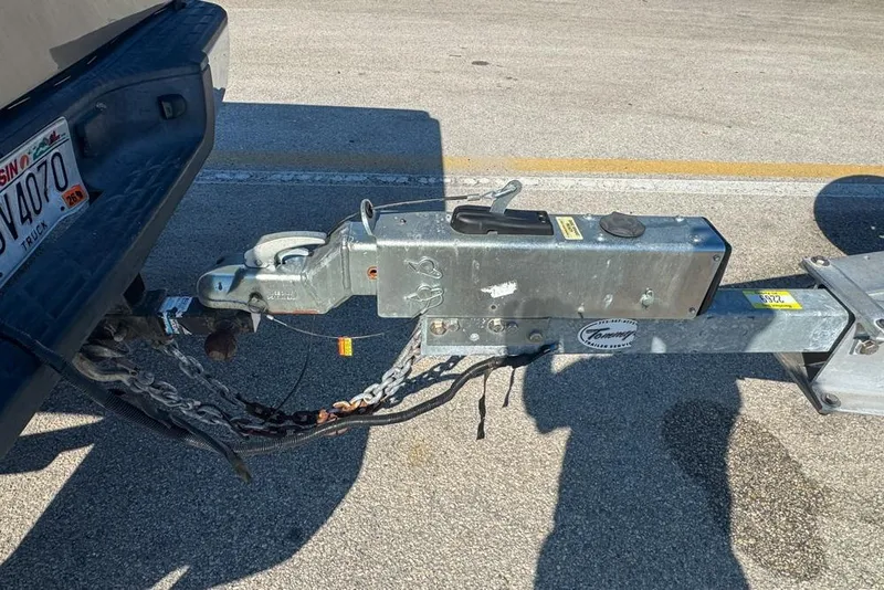 Slide: The Image of Trailer hitch connection for 2021 Wellcraft 262 Fisherman boat on a truck. - 97