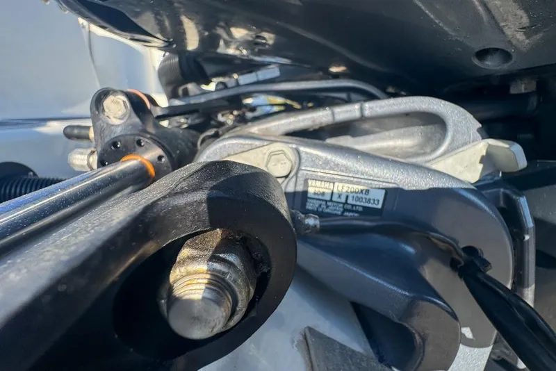 Slide: The Image of Close-up of Yamaha engine components on a 2021 Wellcraft 262 Fisherman boat. - 94