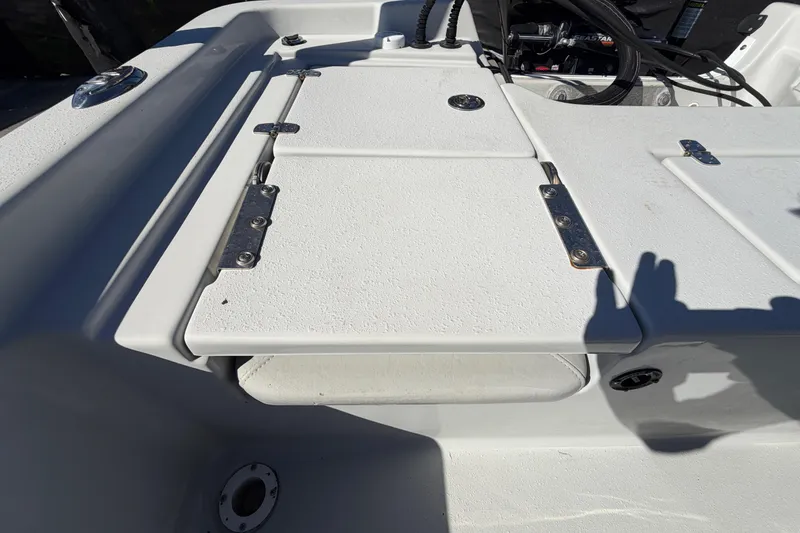 Slide: The Image of 2020 Blazer Bay 2200 Fisherman boat deck with storage compartments and hardware. - 55