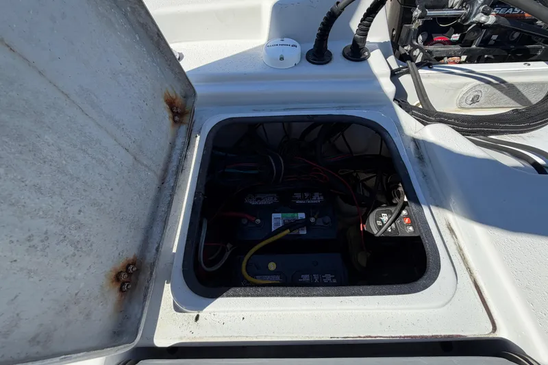 Slide: The Image of Open battery compartment of 2020 Blazer Bay 2200 Fisherman boat. - 67